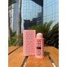 Rave Now Women EDP 100 ml — produktas stilizuotoje aplinkoje; stambus planas; žalumos apsuptyje; plačiausias kadras