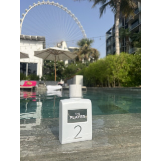 Fragrance World The player 2 EDP 100 ml — товар в стилизованной композиции; очень крупный план; у воды