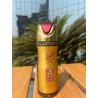 Lattafa Perfume AJWAD 200 ml — товар в стилизованной композиции; очень крупный план; среди зелени; самый широкий кадр