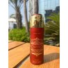 Bade'e Al Oud SUBLIME 200 ml — товар в стилизованной композиции; очень крупный план; среди зелени; самый широкий кадр