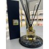 MARABIKA LOST CHERRY EDP 100 ml — toode stiliseeritud keskkonnas; väga lähivõte; valgel taustal